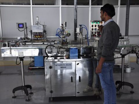 Automatic foil sealing machine in perfume plant